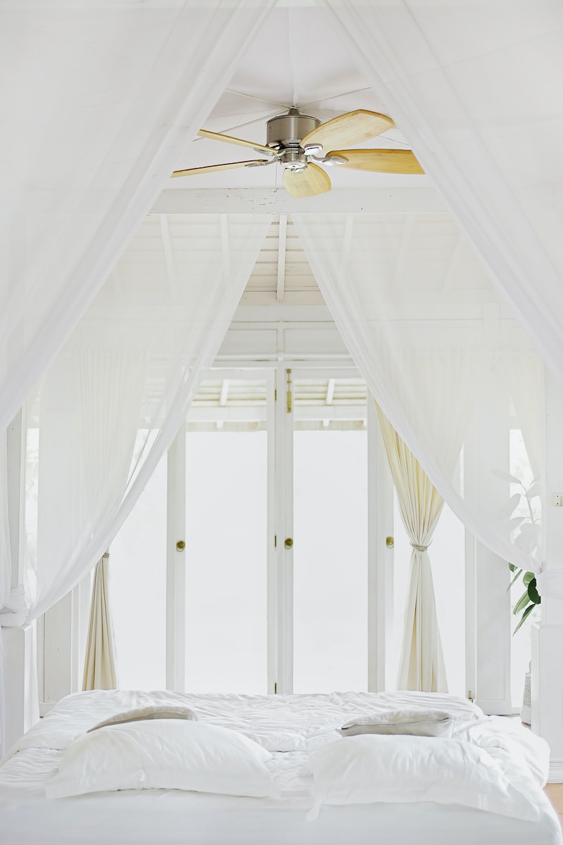 Bed sheet near glass window