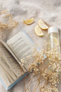 Natural bedroom styling with dried flower petals and organic textures